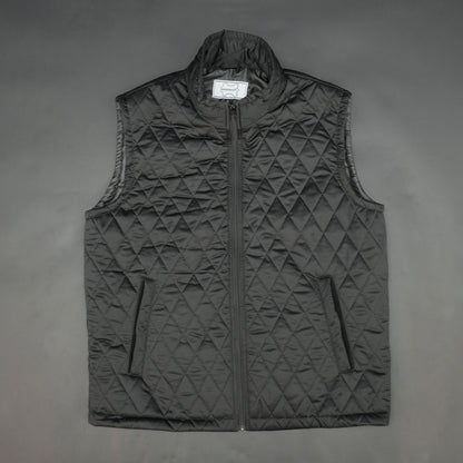 Lightweight black quilted sleeveless  puffer vest with zip closure, side and inside pockets, ideal for layering