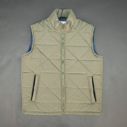 Green sleeveless puffer vest with zip closure, side and inner pockets, lightweight and ideal for layering.