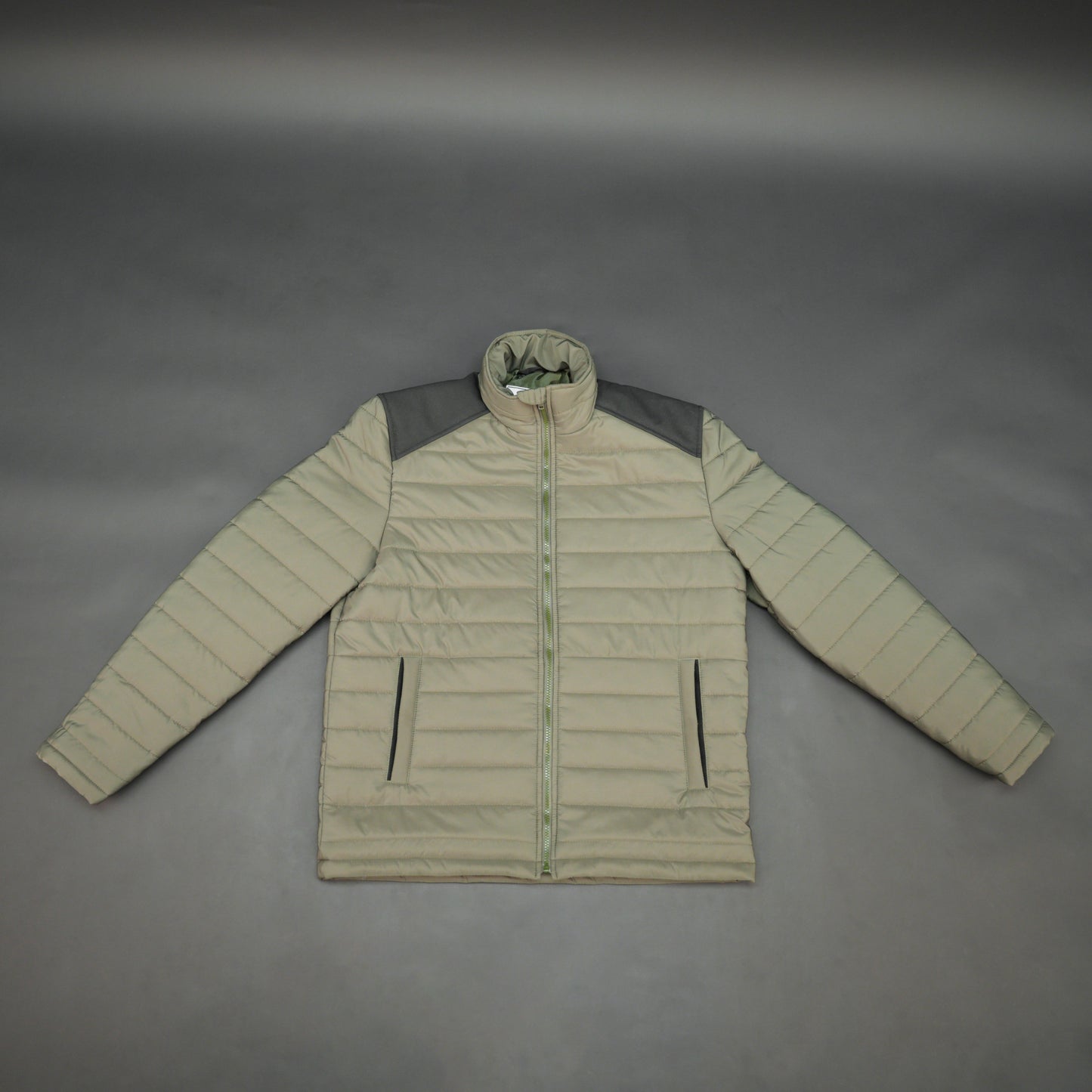 Olive sleeveless puffer vest with zip, side and inside pockets, lightweight for layering