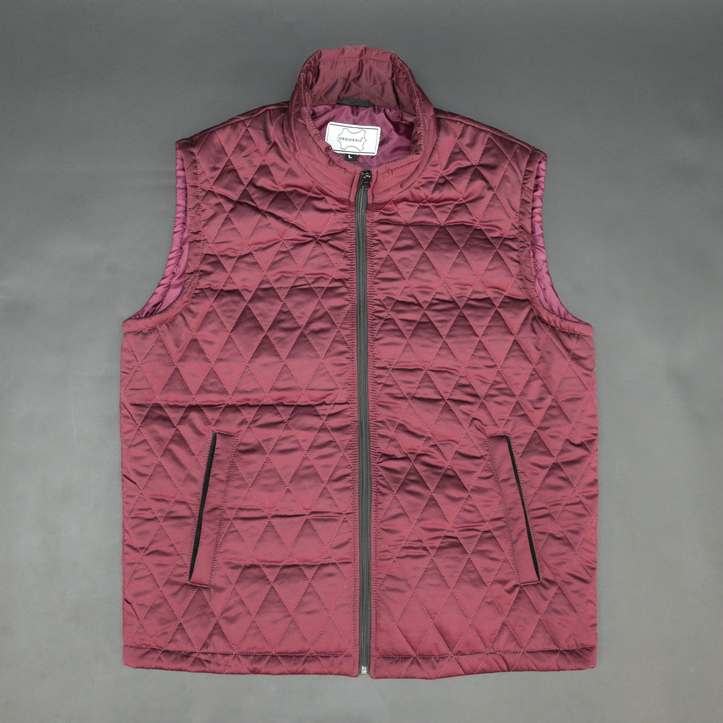 Maroon quilted sleeveless  puffer vest with zip closure, side and inside pockets, ideal for layering