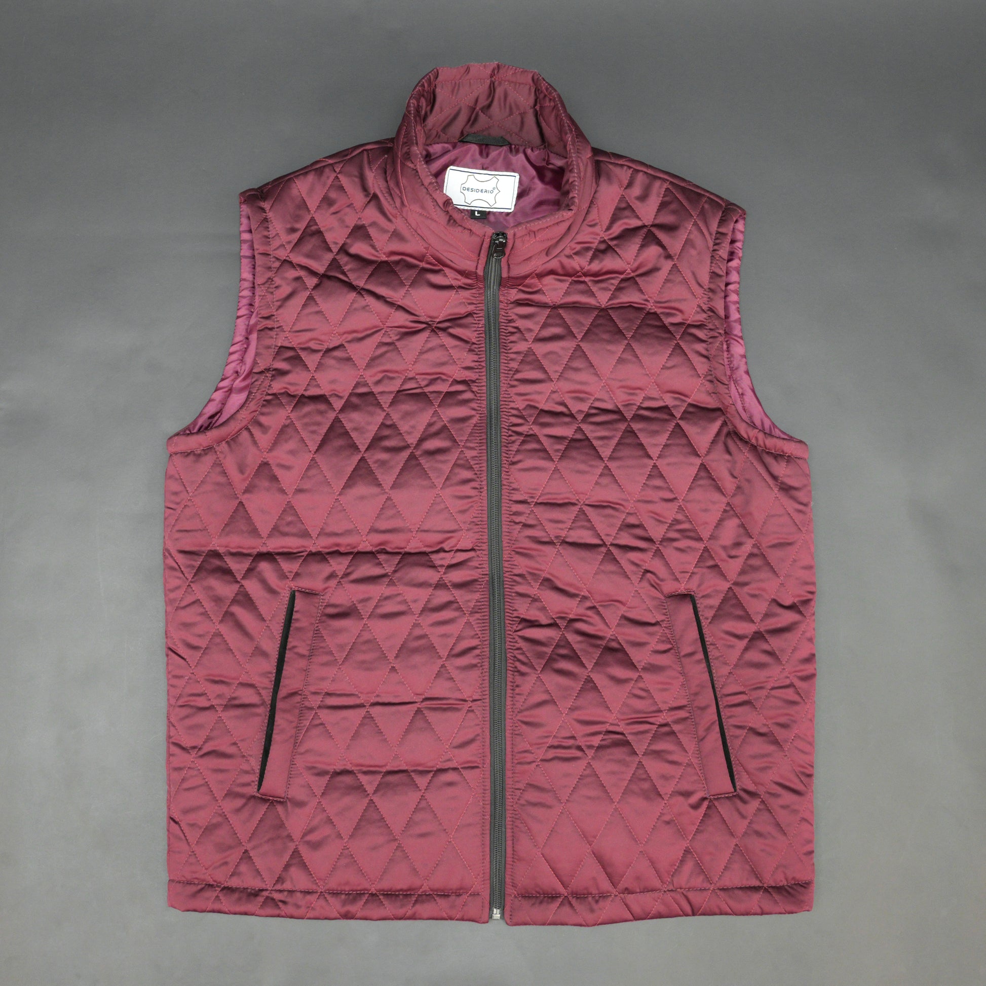 Maroon quilted sleeveless  puffer vest with zip closure, side and inside pockets, ideal for layering