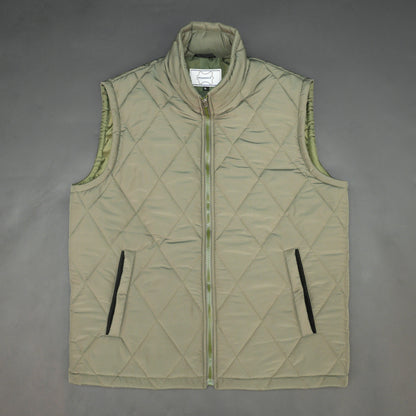 Green sleeveless puffer vest with zip, side and inside pockets, lightweight for layering