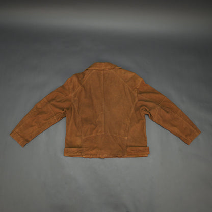 Light brown goat suede perfecto jacket with leather-finish, soft suede texture, three exterior pockets, secure side zip pocket, and adjustable zipped cuffs for a tailored fit