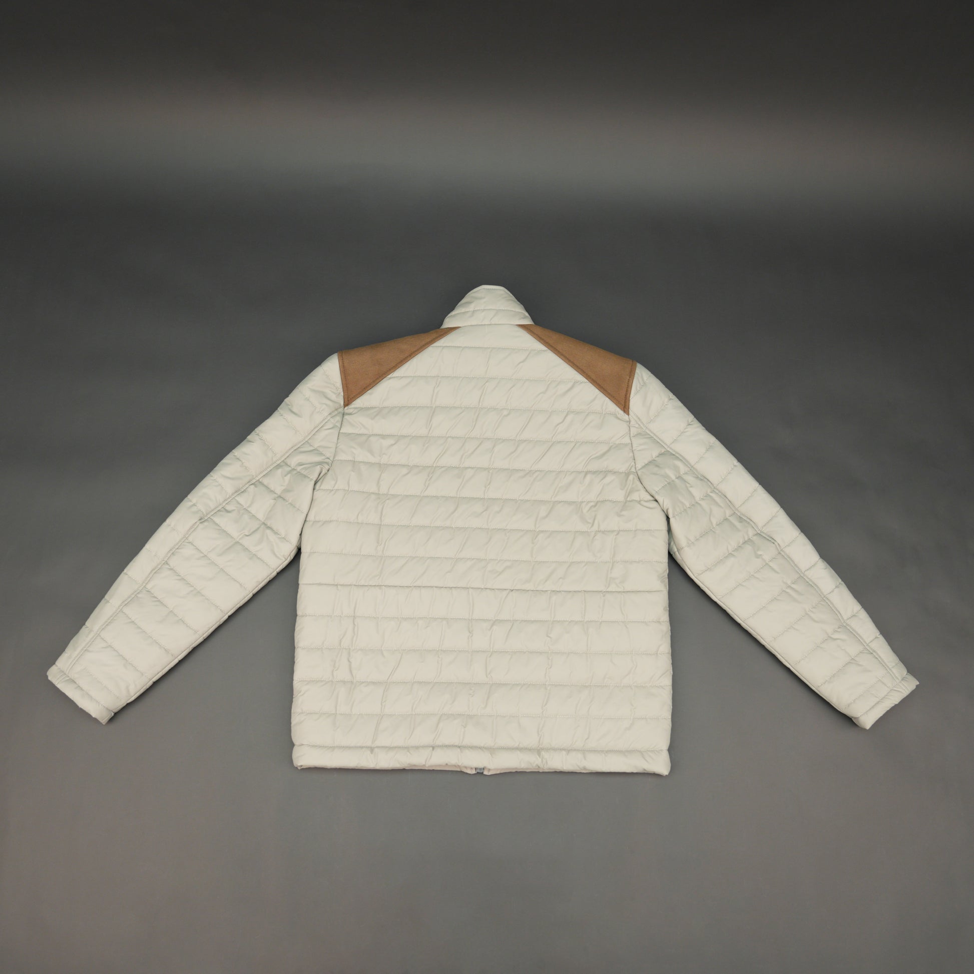 Blue sleeveless puffer vest with zip, side and inside pockets, lightweight for layering