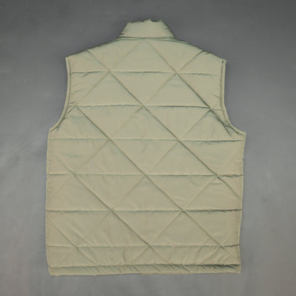 Green sleeveless puffer vest with zip closure, side and inner pockets, lightweight and ideal for layering.