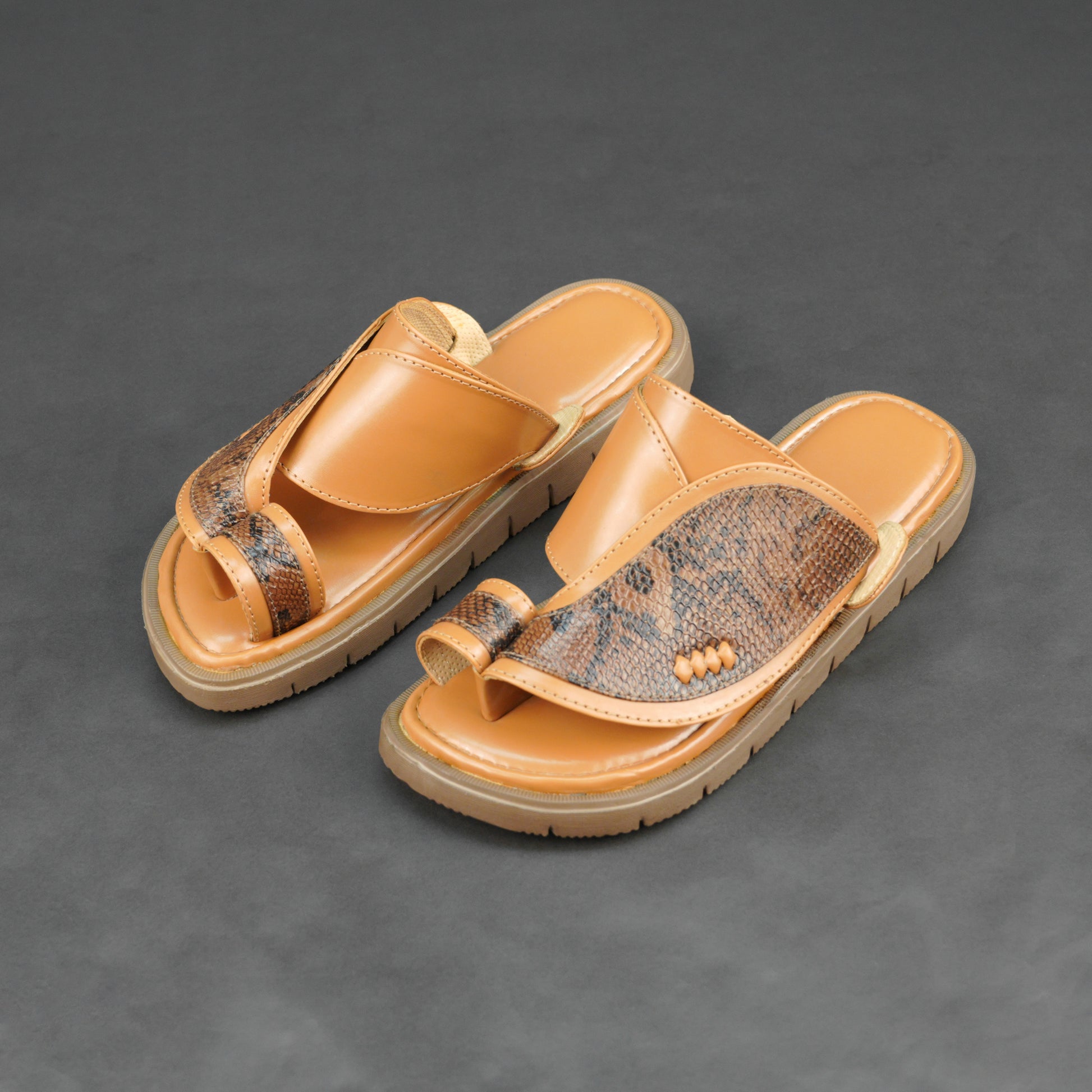 Tan Arabic chappal with snake-pattern upper and EVA sole for comfort and durability.