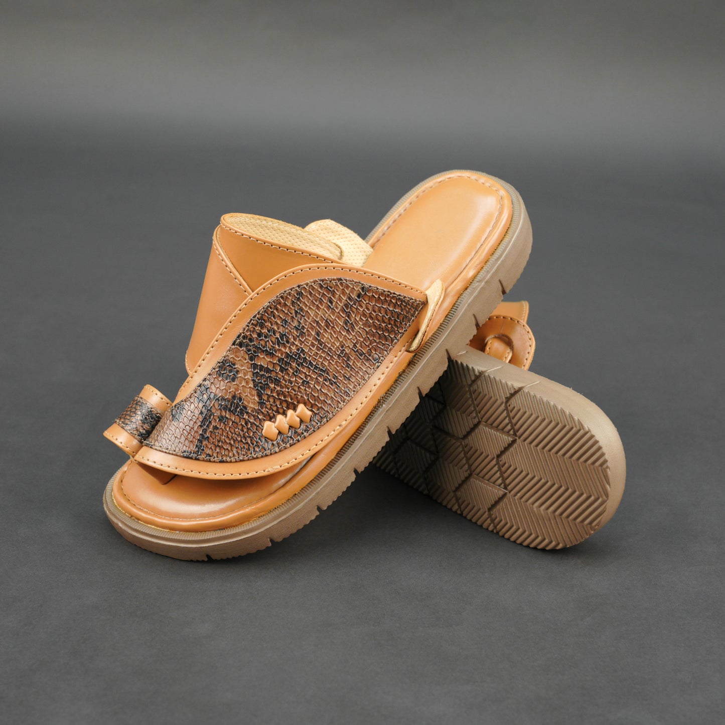 Tan Arabic chappal with snake-pattern upper and EVA sole for comfort and durability.