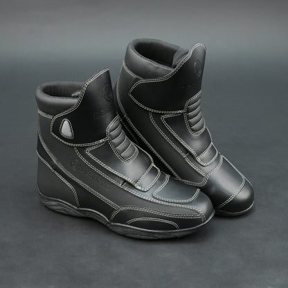 Premium black bovine leather biker boots with white stitching and Velcro straps.