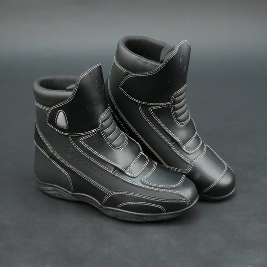 Premium black bovine leather biker boots with white stitching and Velcro straps.