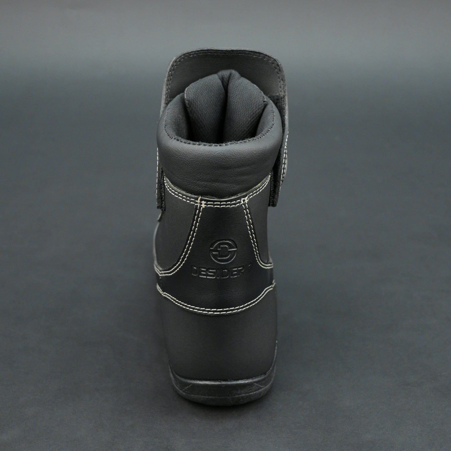 Premium black bovine leather biker boots with white stitching and Velcro straps.