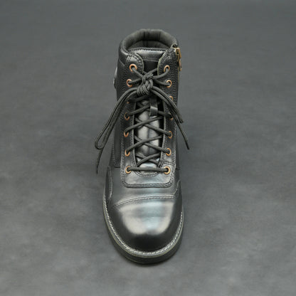 Black high-ankle bovine leather motorbike boots.