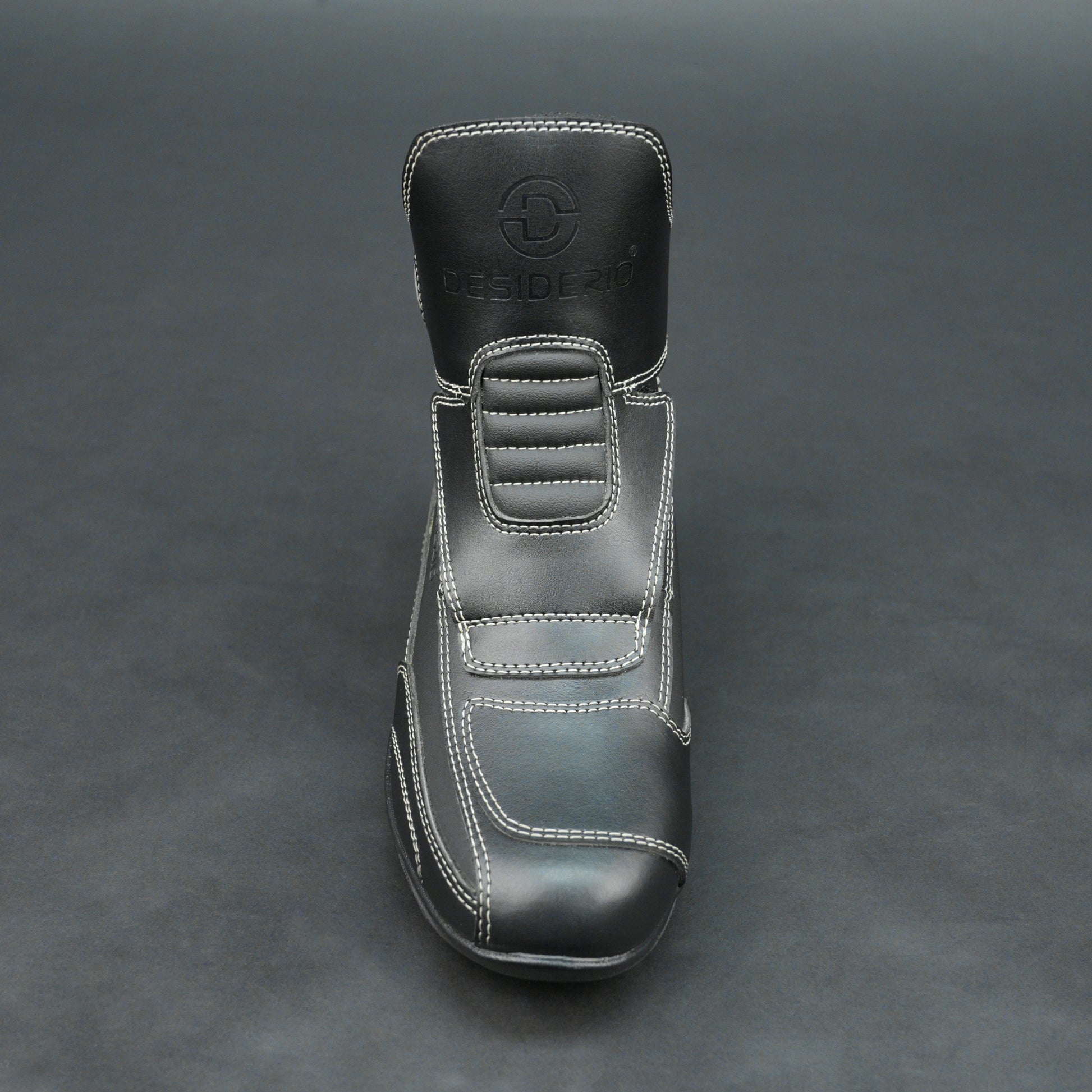 Premium black bovine leather biker boots with white stitching and Velcro straps.