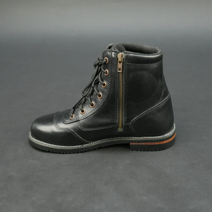 Black high-ankle bovine leather motorbike boots.