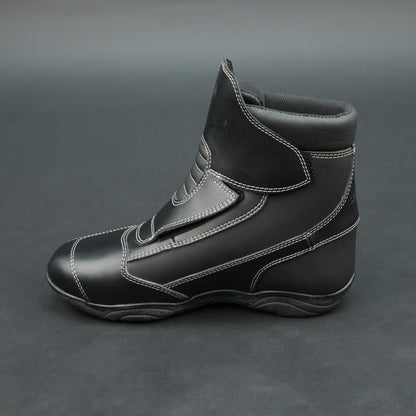 Premium black bovine leather biker boots with white stitching and Velcro straps.