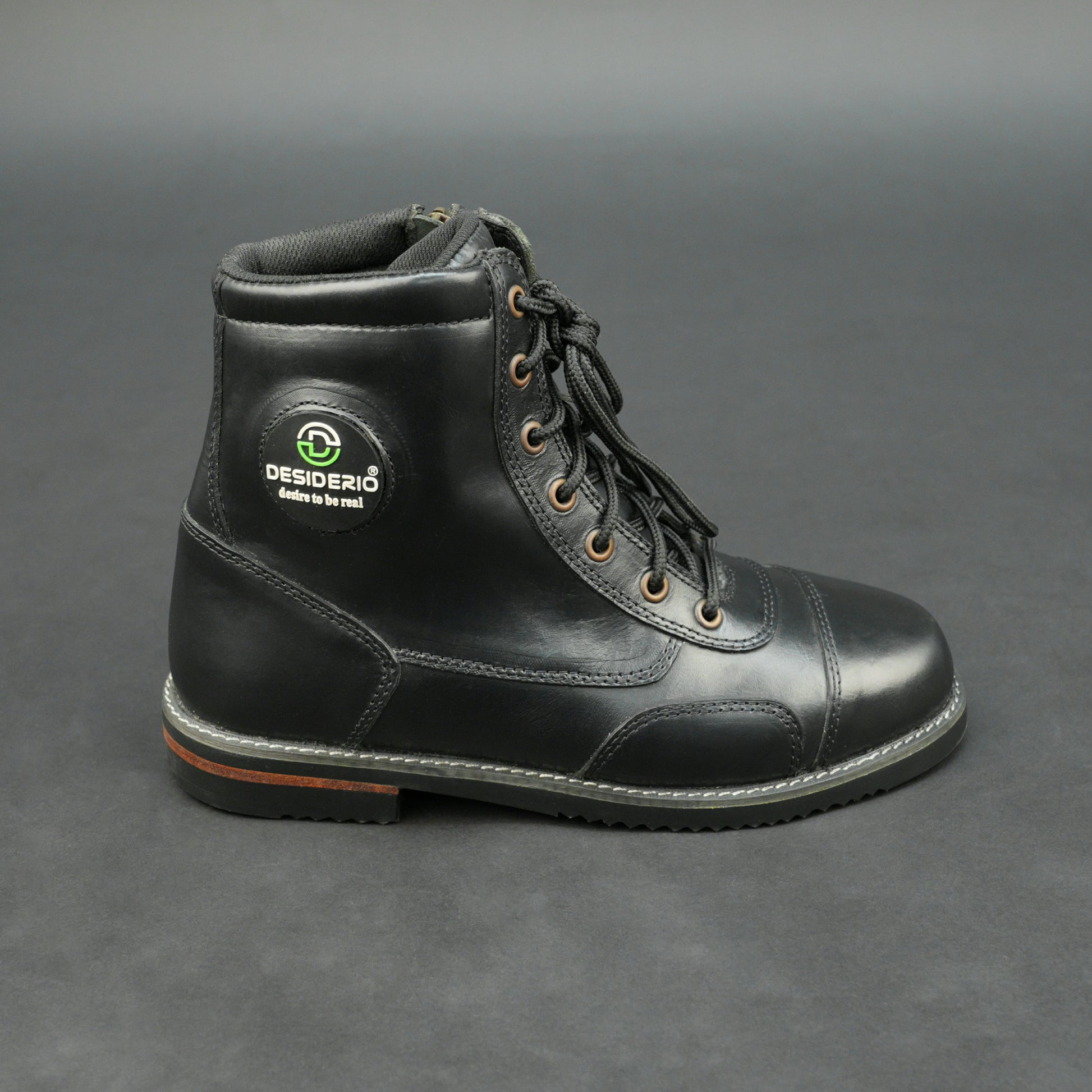 Black high-ankle bovine leather motorbike boots.