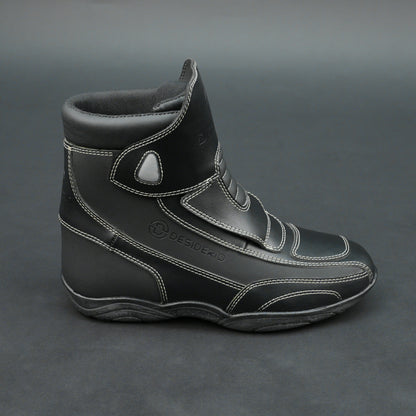 Premium black bovine leather biker boots with white stitching and Velcro straps.