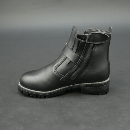 Matte black bovine leather biker boots with side buckle and zipper.
