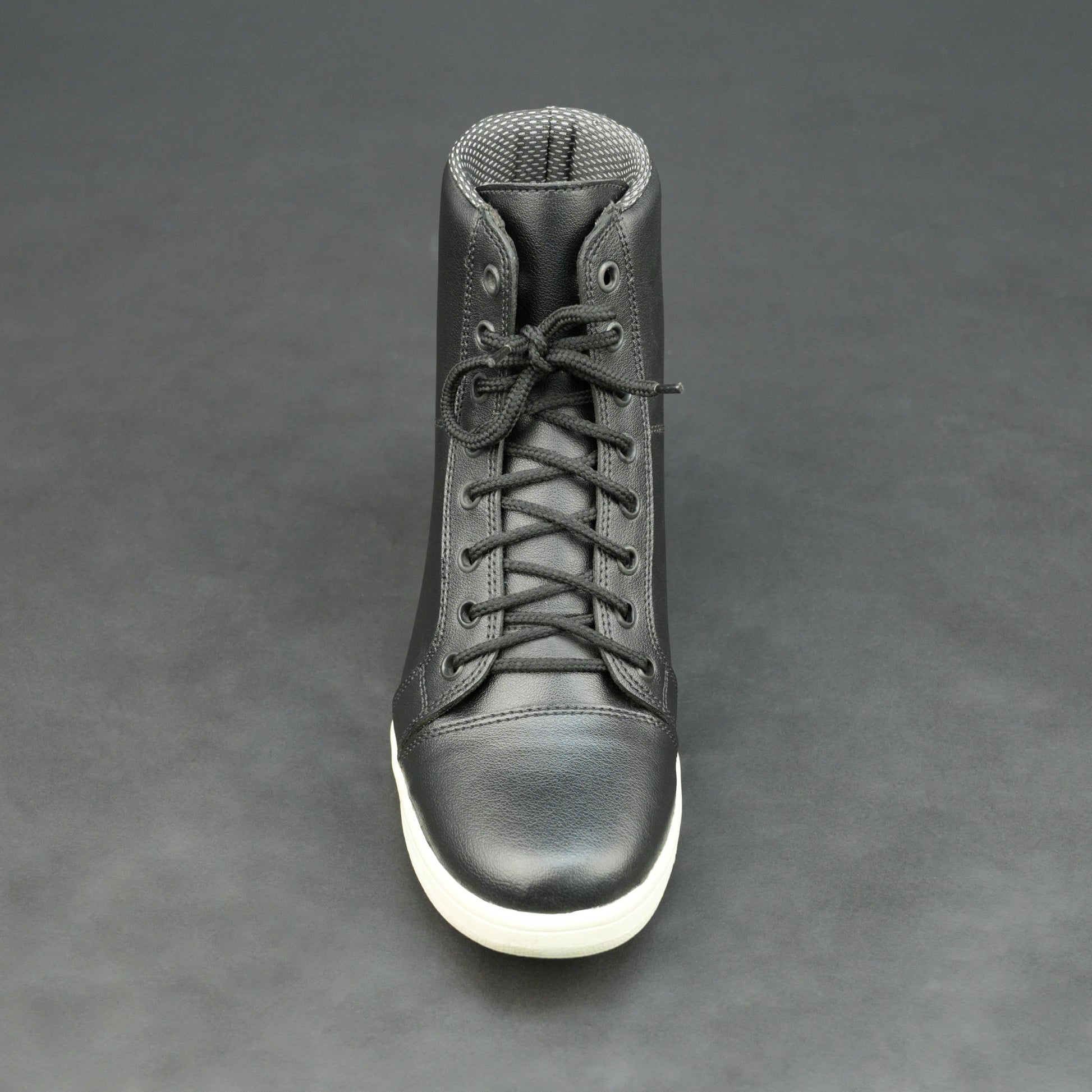 Black high-top leather sneakers with white sole.