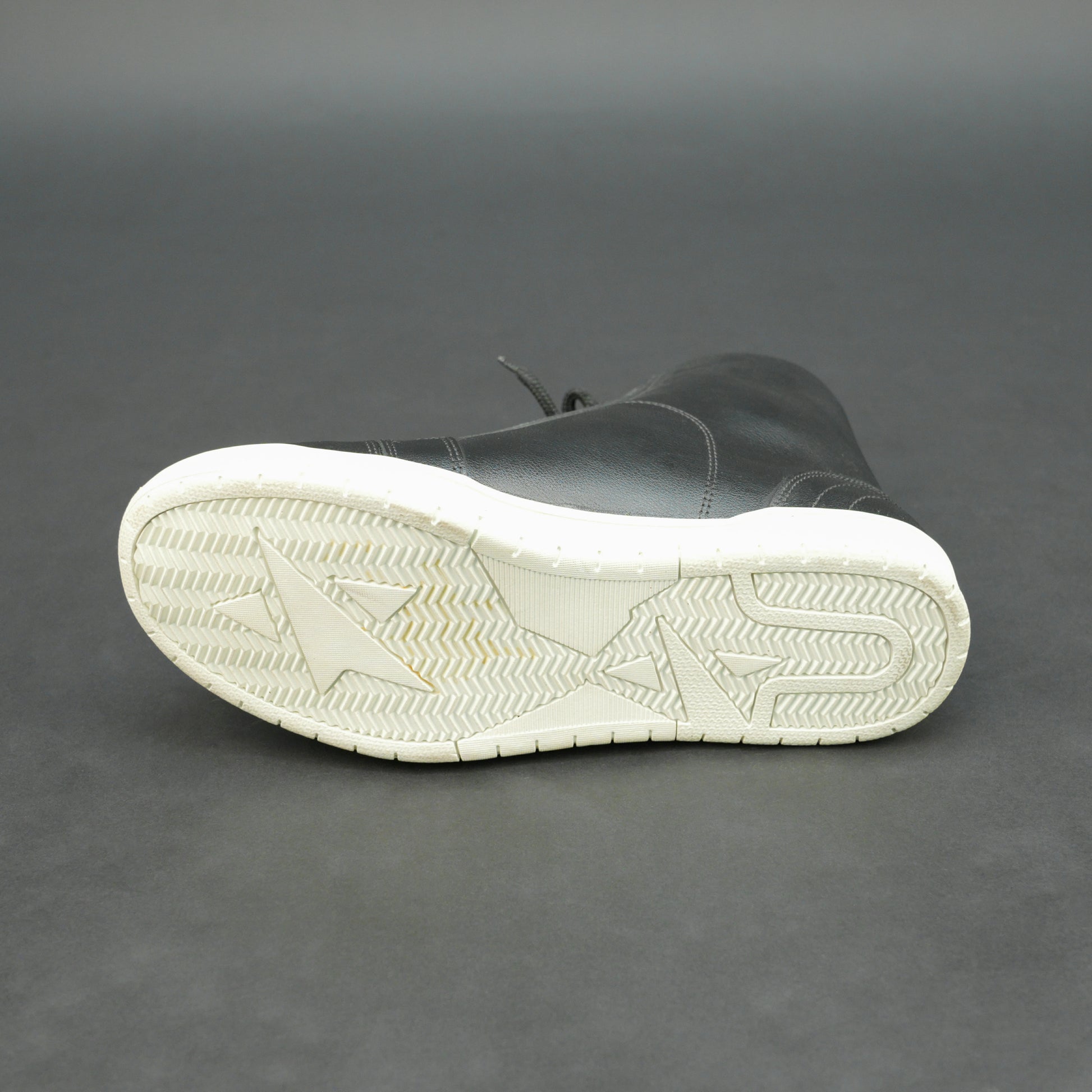 Black high-top leather sneakers with white sole.