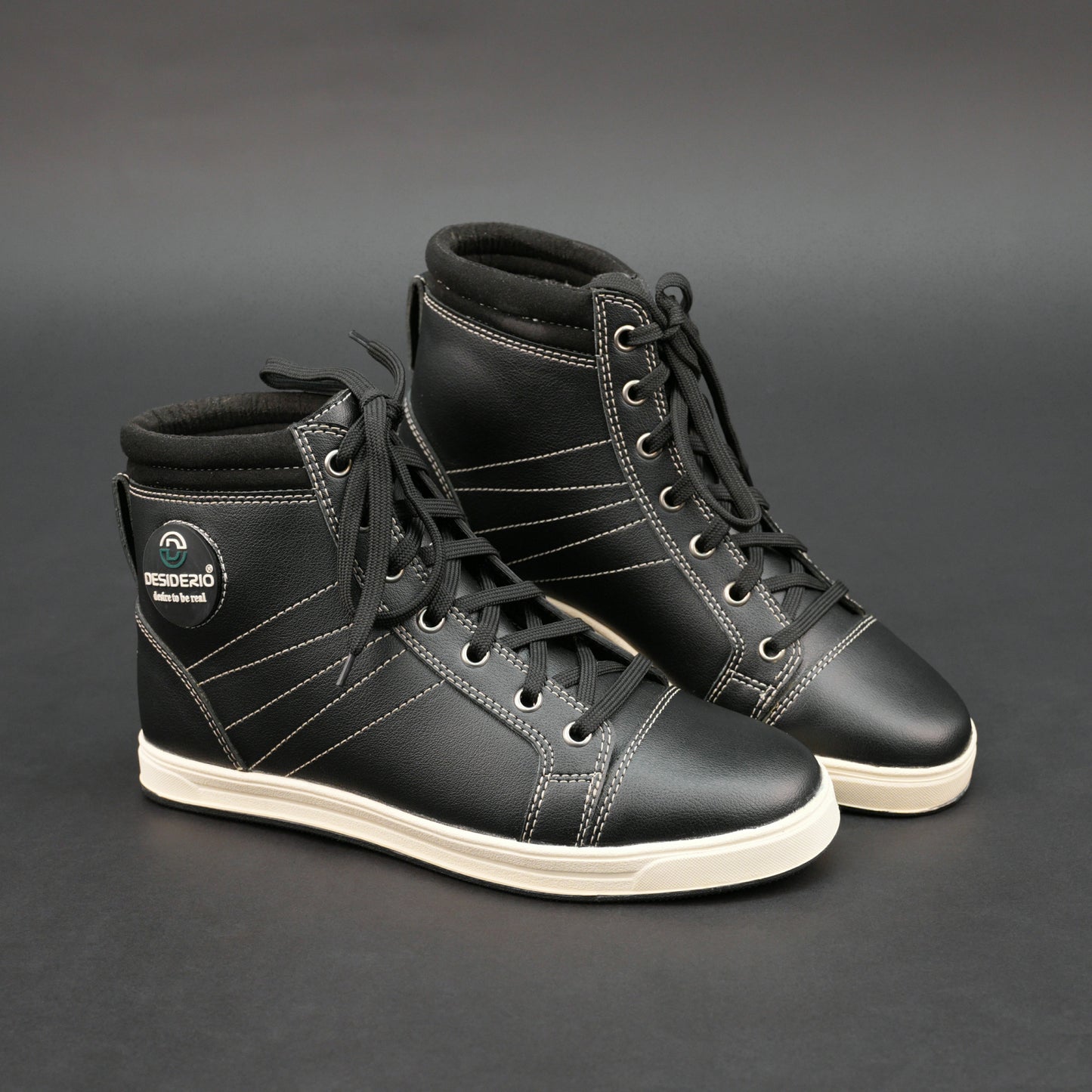 Black high-top bovine leather sneakers with white stitching and white sole.