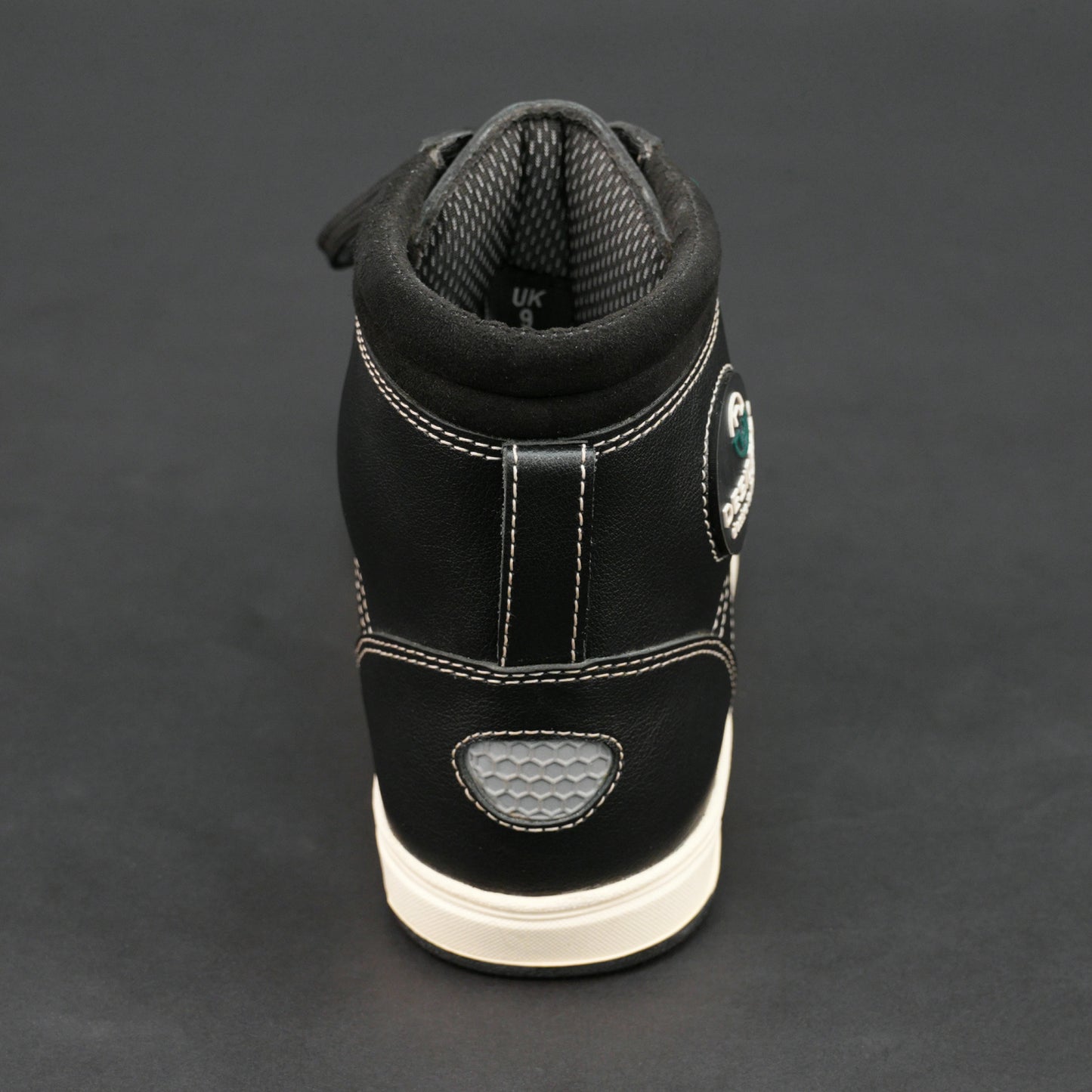 Black high-top bovine leather sneakers with white stitching and white sole.
