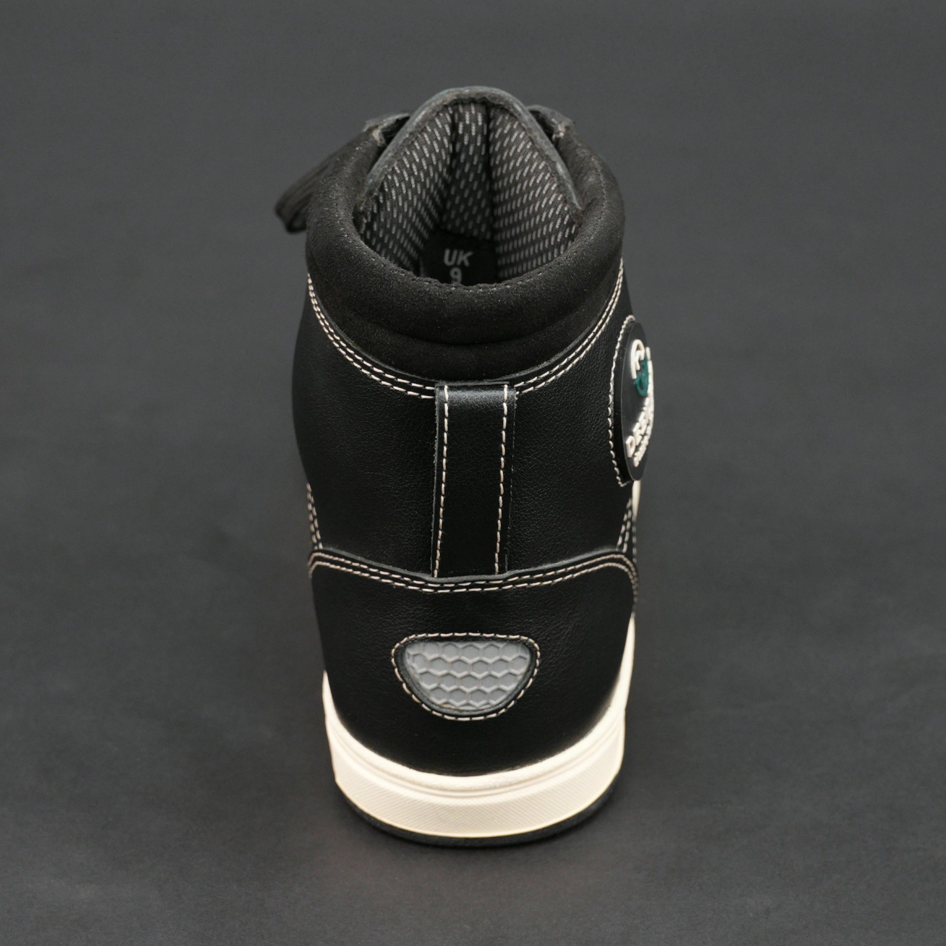 Black high-top bovine leather sneakers with white stitching and white sole.