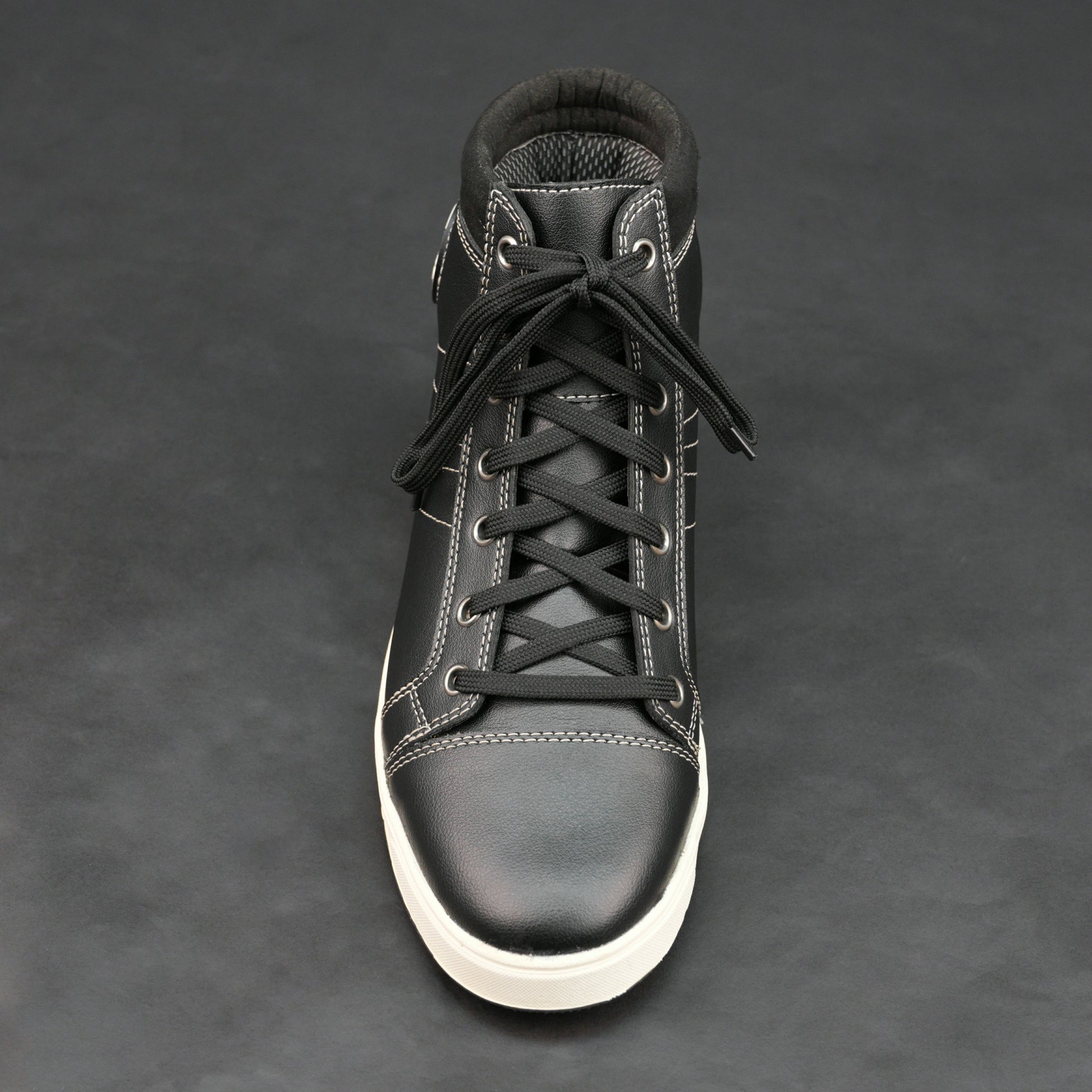 Black high-top bovine leather sneakers with white stitching and white sole.