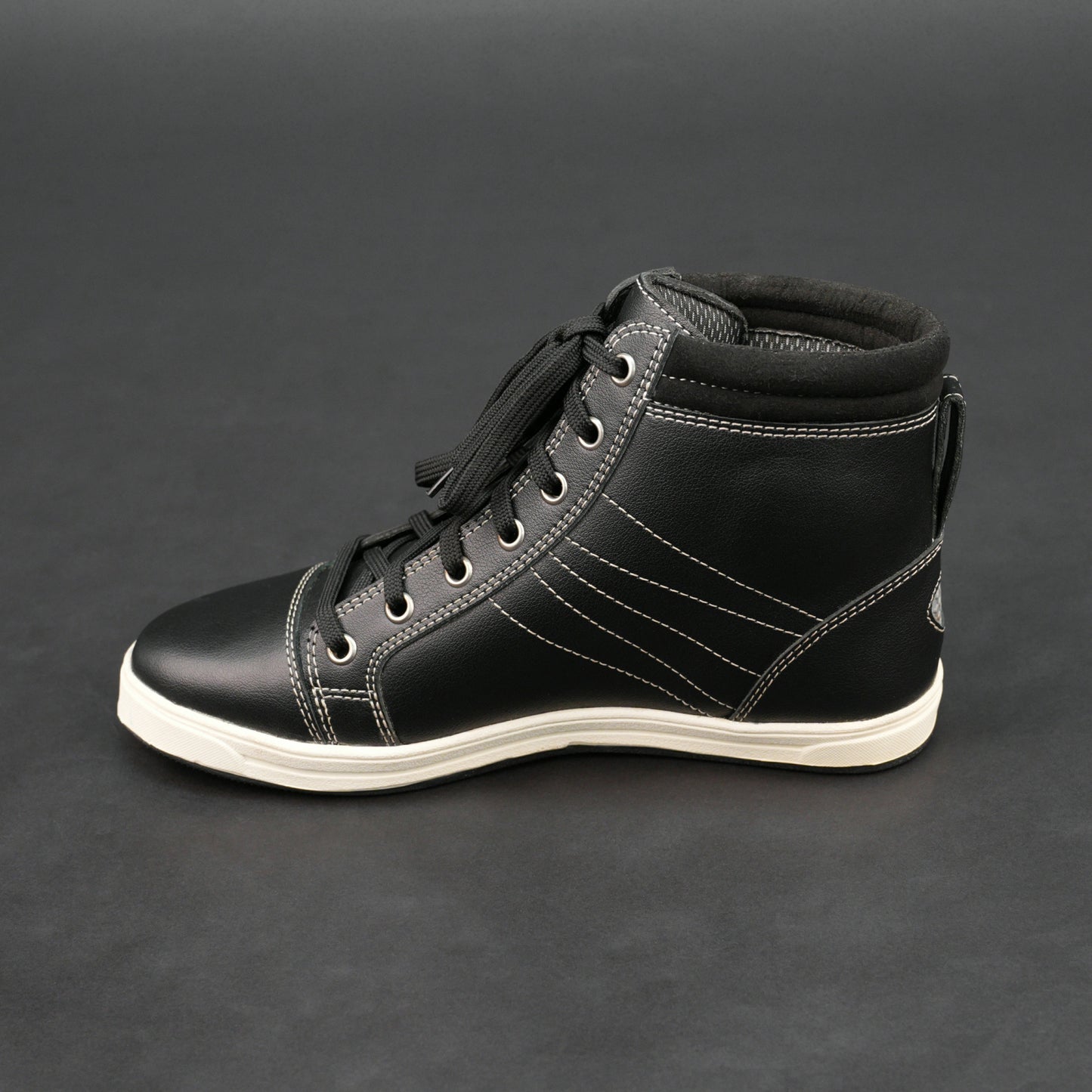 Black high-top bovine leather sneakers with white stitching and white sole.