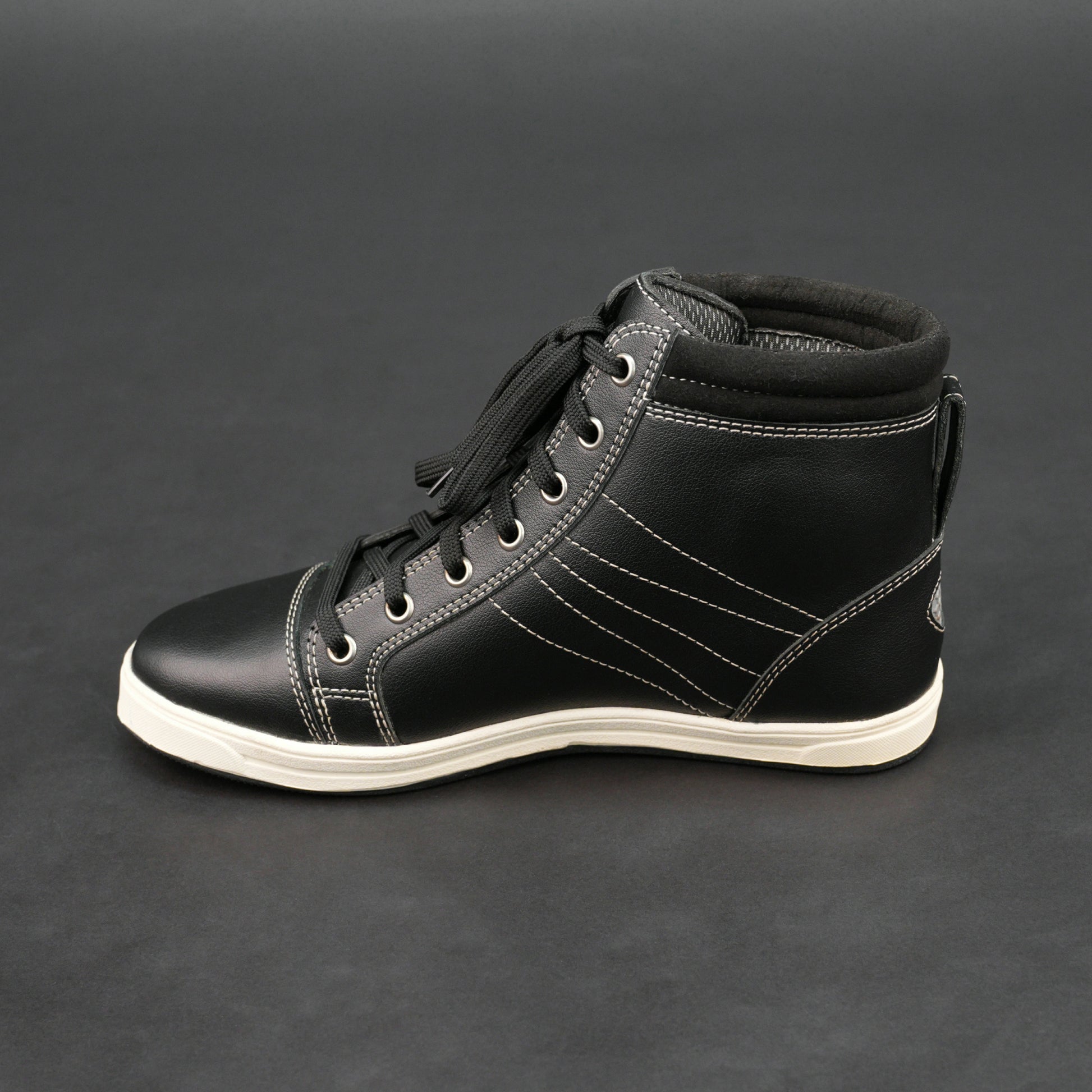 Black high-top bovine leather sneakers with white stitching and white sole.