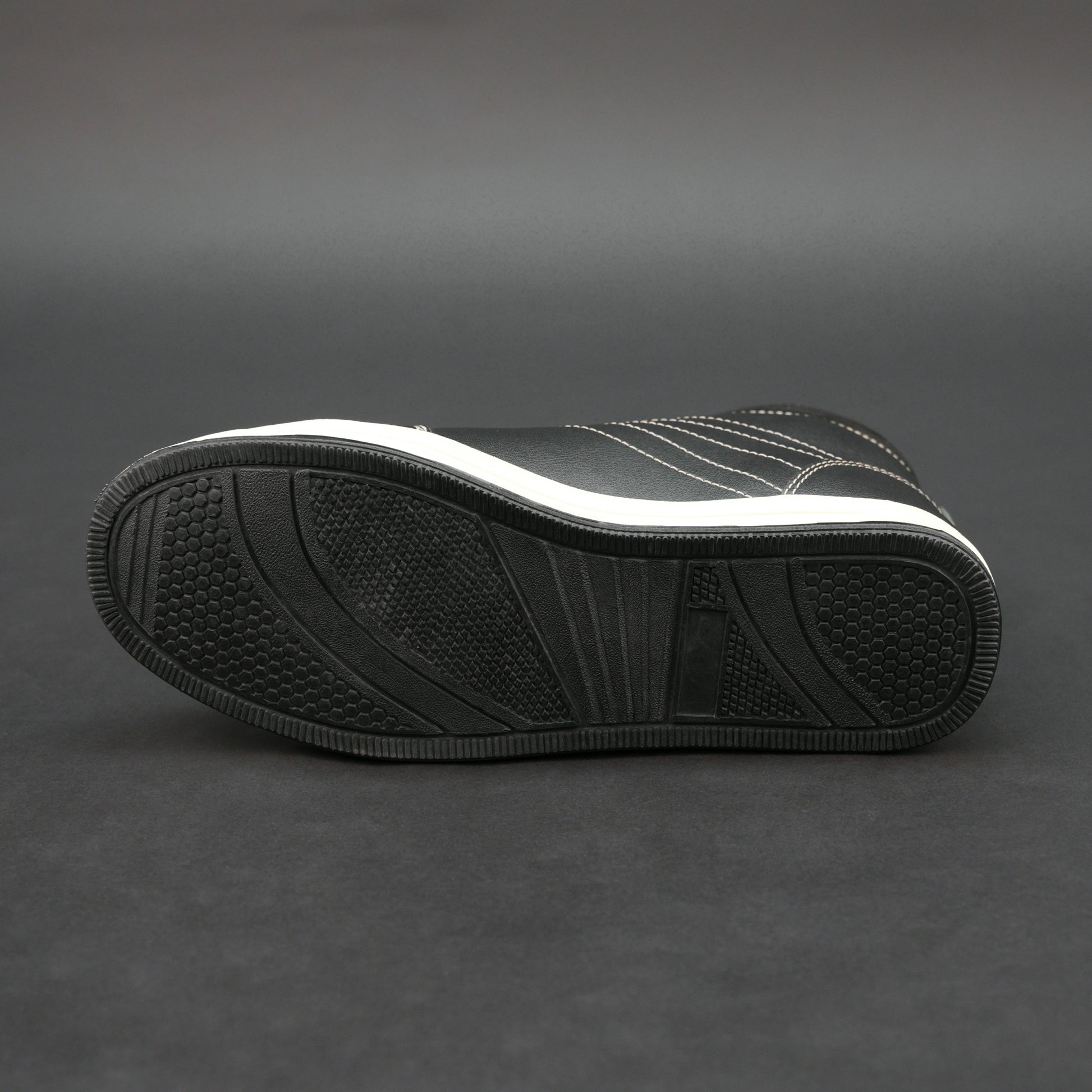 Black high-top bovine leather sneakers with white stitching and white sole.