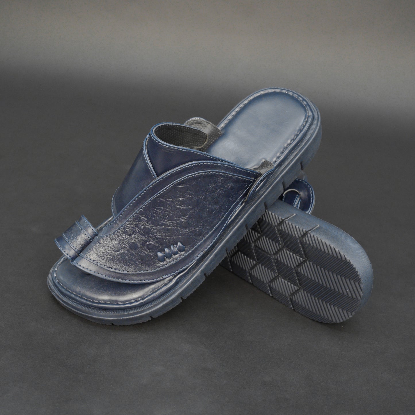 Blue Arabic chappal with textured PU upper and EVA sole.