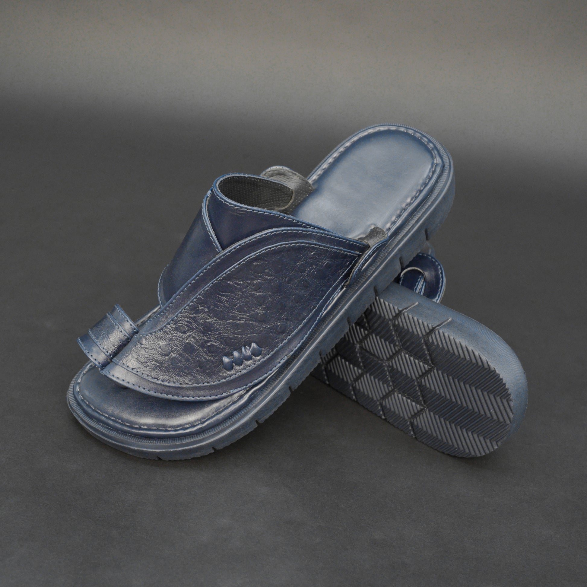 Blue Arabic chappal with textured PU upper and EVA sole.