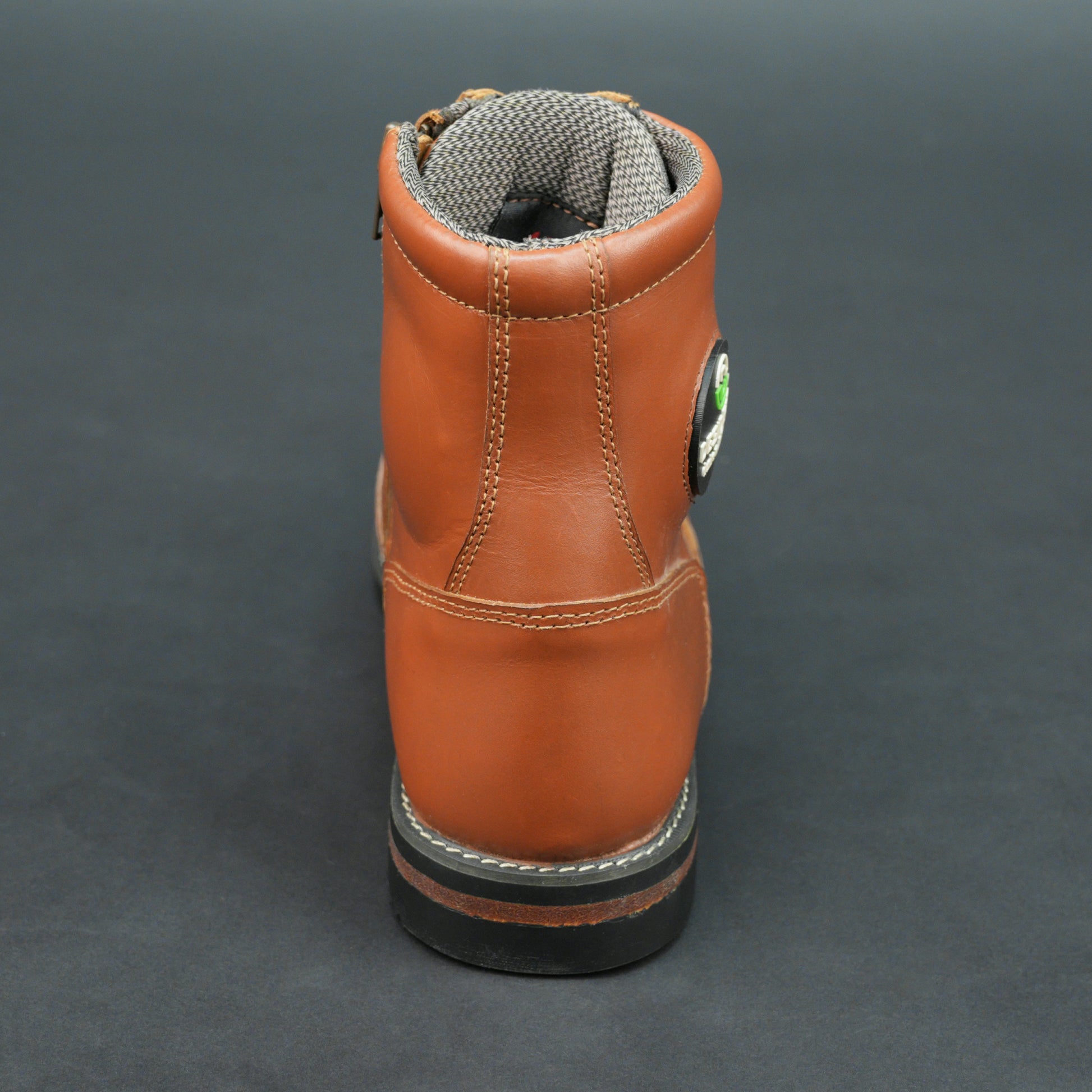 Brown bovine leather motorbike boots with side zipper and black laces.