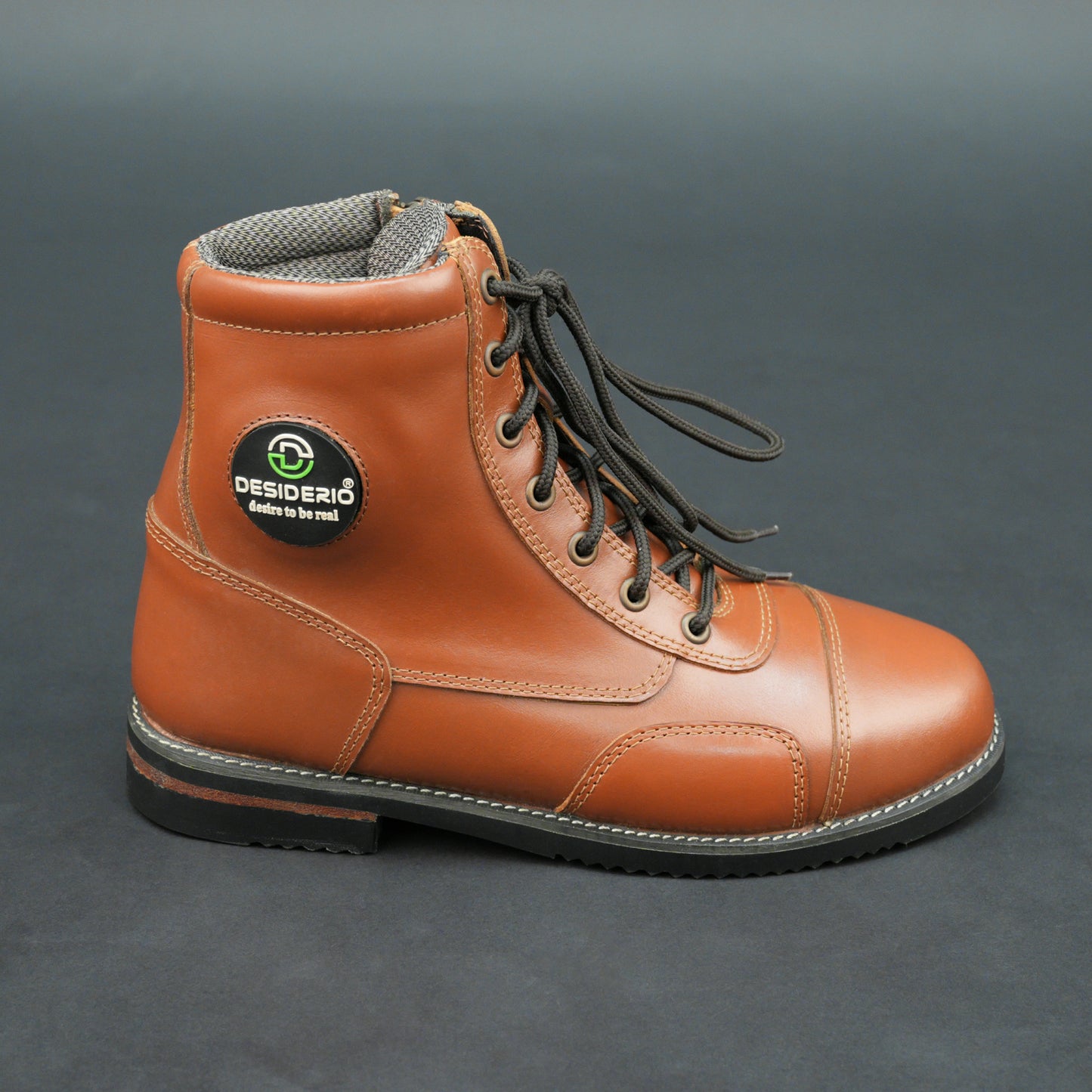 Brown bovine leather motorbike boots with side zipper and black laces.