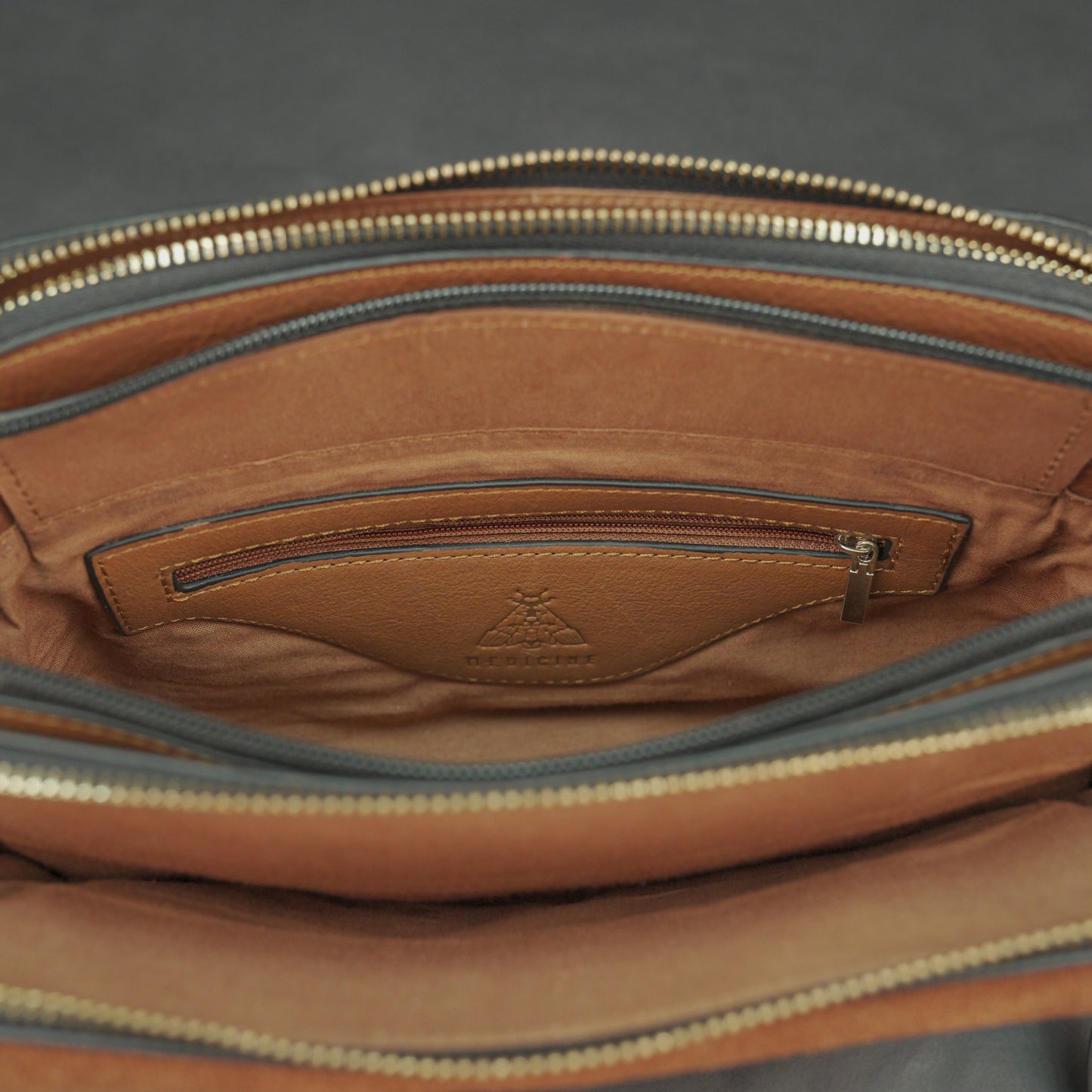Nano Casetto Leather Crossbody Bag in 100% genuine cowhide leather with a compact, lightweight design, adjustable strap, and secure zip closure—perfect for daily wear, travel, and casual outings.