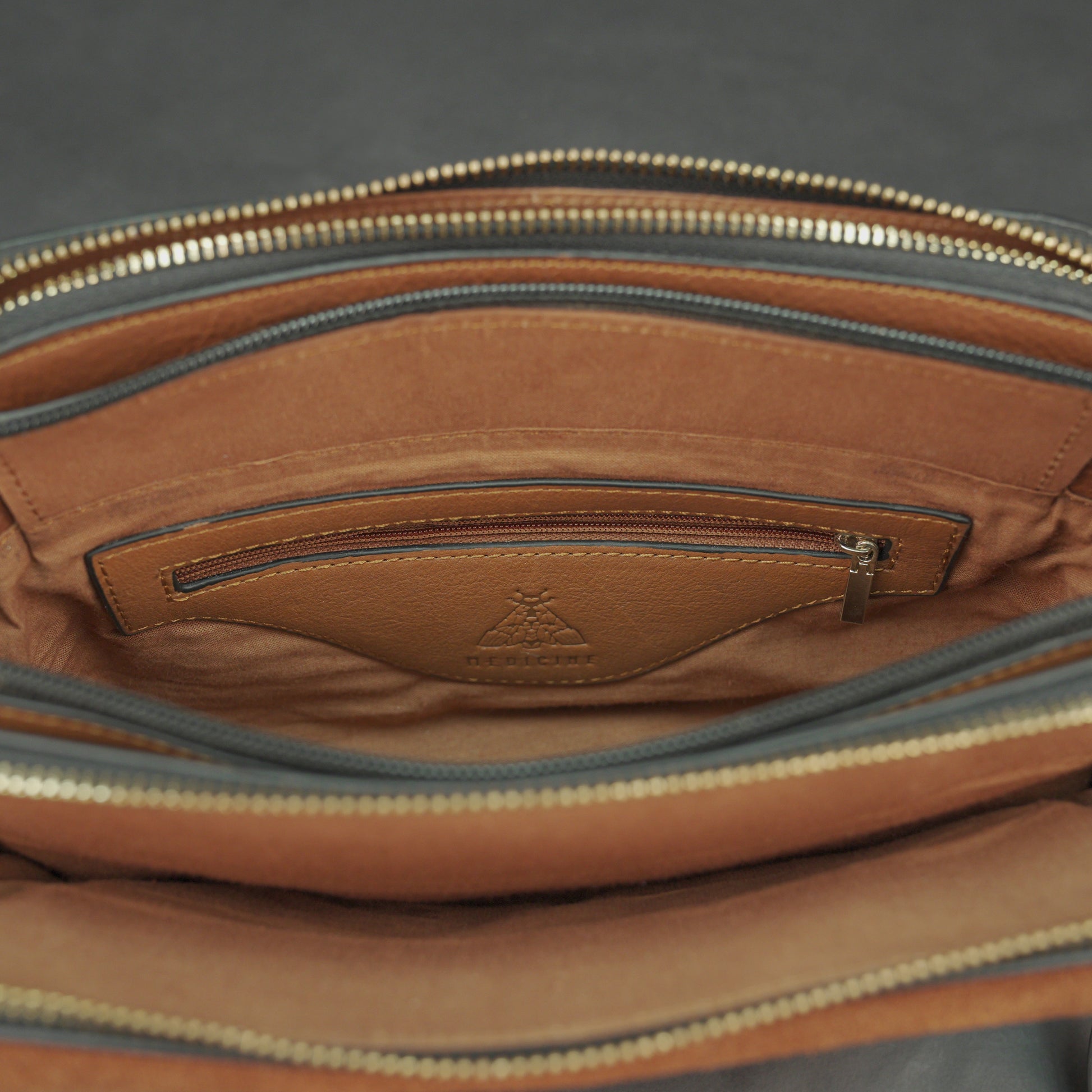 Nano Casetto Leather Crossbody Bag in 100% genuine cowhide leather with a compact, lightweight design, adjustable strap, and secure zip closure—perfect for daily wear, travel, and casual outings.