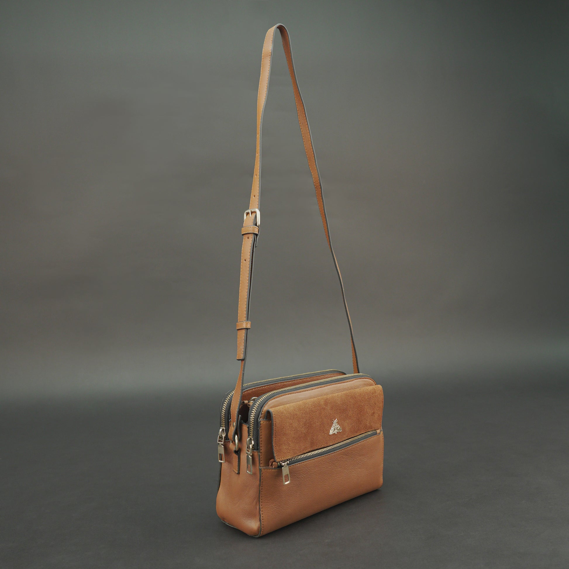 Nano Casetto Leather Crossbody Bag in 100% genuine cowhide leather with a compact, lightweight design, adjustable strap, and secure zip closure—perfect for daily wear, travel, and casual outings.