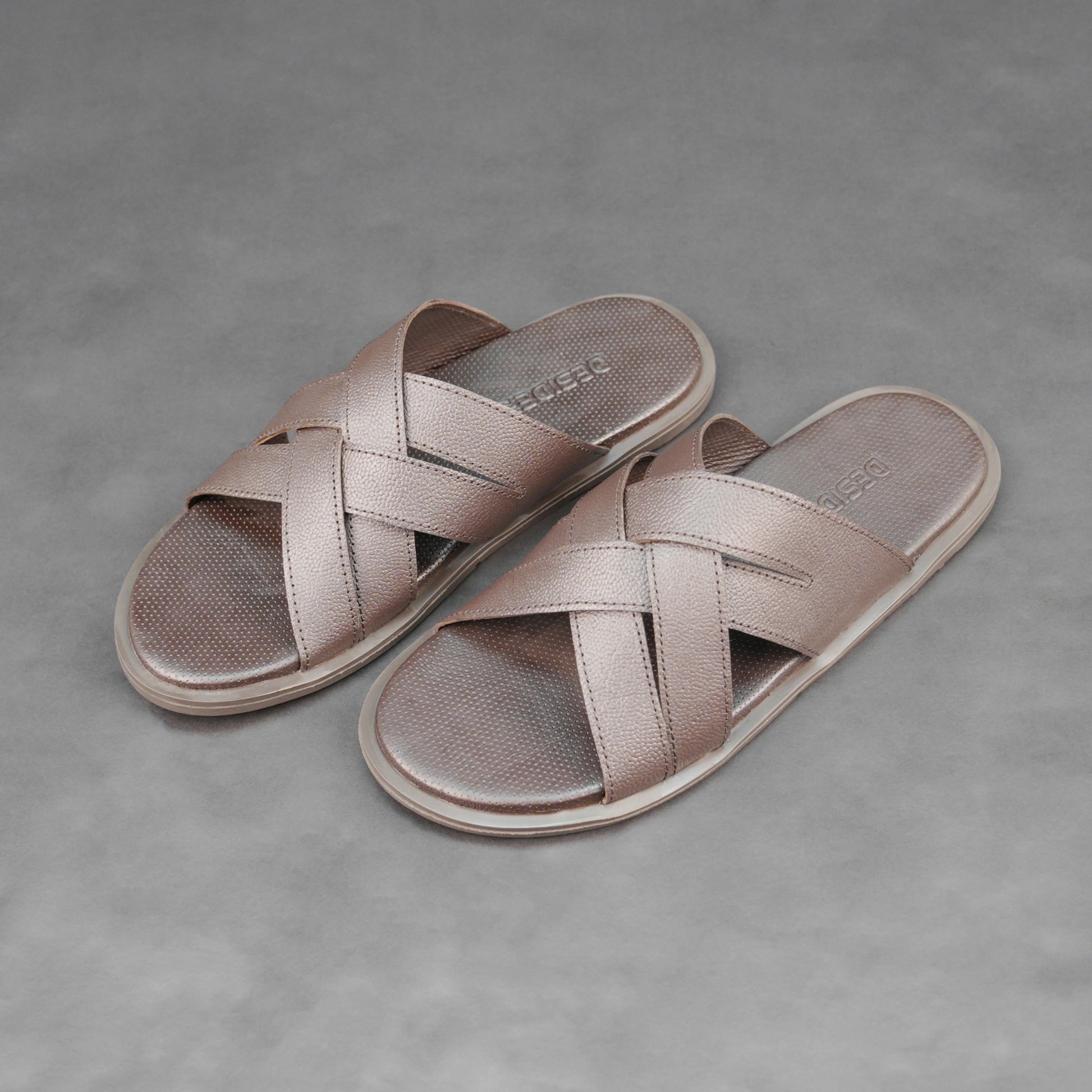 Brown cow printed leather footwear with cushioned insole and TPR sole.