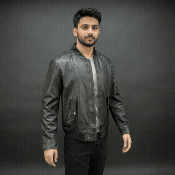 Black jacket with front zip closure, snap-button cuffs, one left arm pocket, two side pockets, and two inside pockets, combining stylish design with functional storage