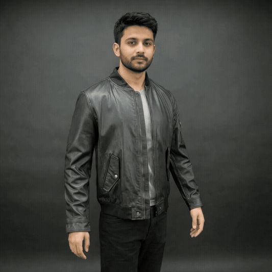 Black jacket with front zip closure, snap-button cuffs, one left arm pocket, two side pockets, and two inside pockets, combining stylish design with functional storage