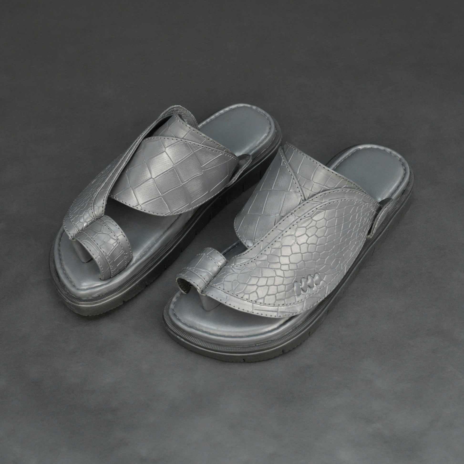 Grey Arabic chappal with croco-textured PU upper and EVA sole.