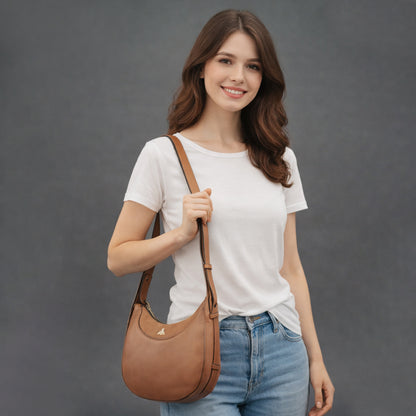 Leather Loop Bag in 100% genuine cowhide leather featuring an elegant loop handle, spacious interior, and durable stitching—perfect for work and everyday casual wear.