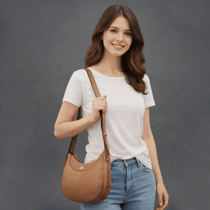 Leather Loop Bag in 100% genuine cowhide leather featuring an elegant loop handle, spacious interior, and durable stitching—perfect for work and everyday casual wear.