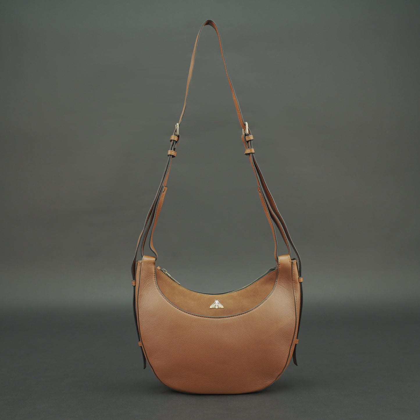 Leather Loop Bag in 100% genuine cowhide leather featuring an elegant loop handle, spacious interior, and durable stitching—perfect for work and everyday casual wear.