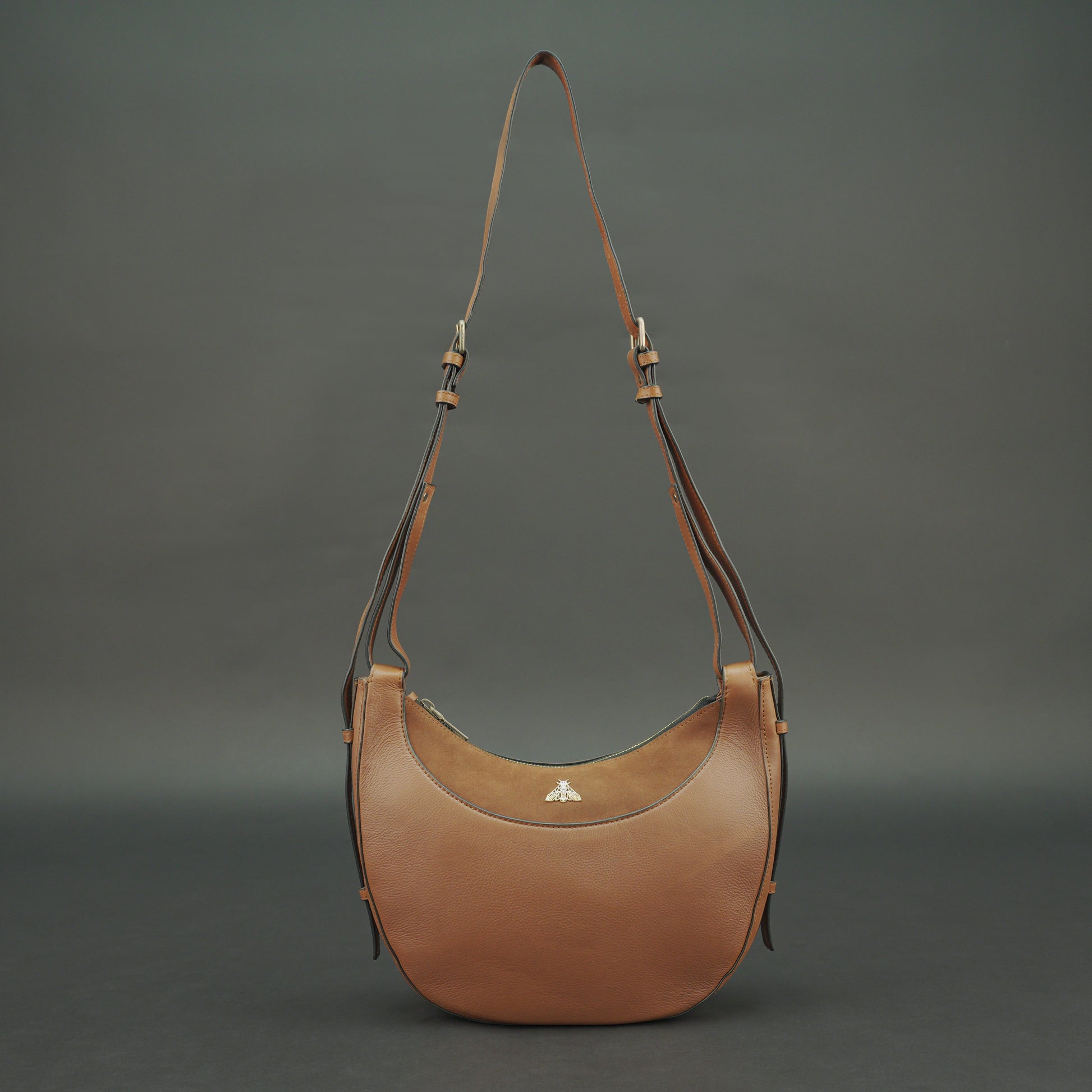 Leather Loop Bag in 100% genuine cowhide leather featuring an elegant loop handle, spacious interior, and durable stitching—perfect for work and everyday casual wear.