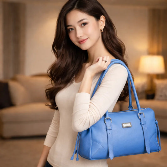 Blue cow PDM leather bag with shoulder strap and pockets.