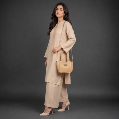 Beige cow Bamie leather bag with straps and pockets.