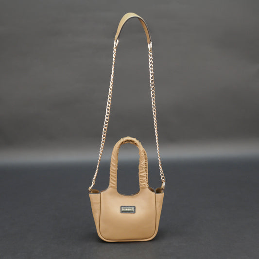 Beige cow Bamie leather bag with straps and pockets.