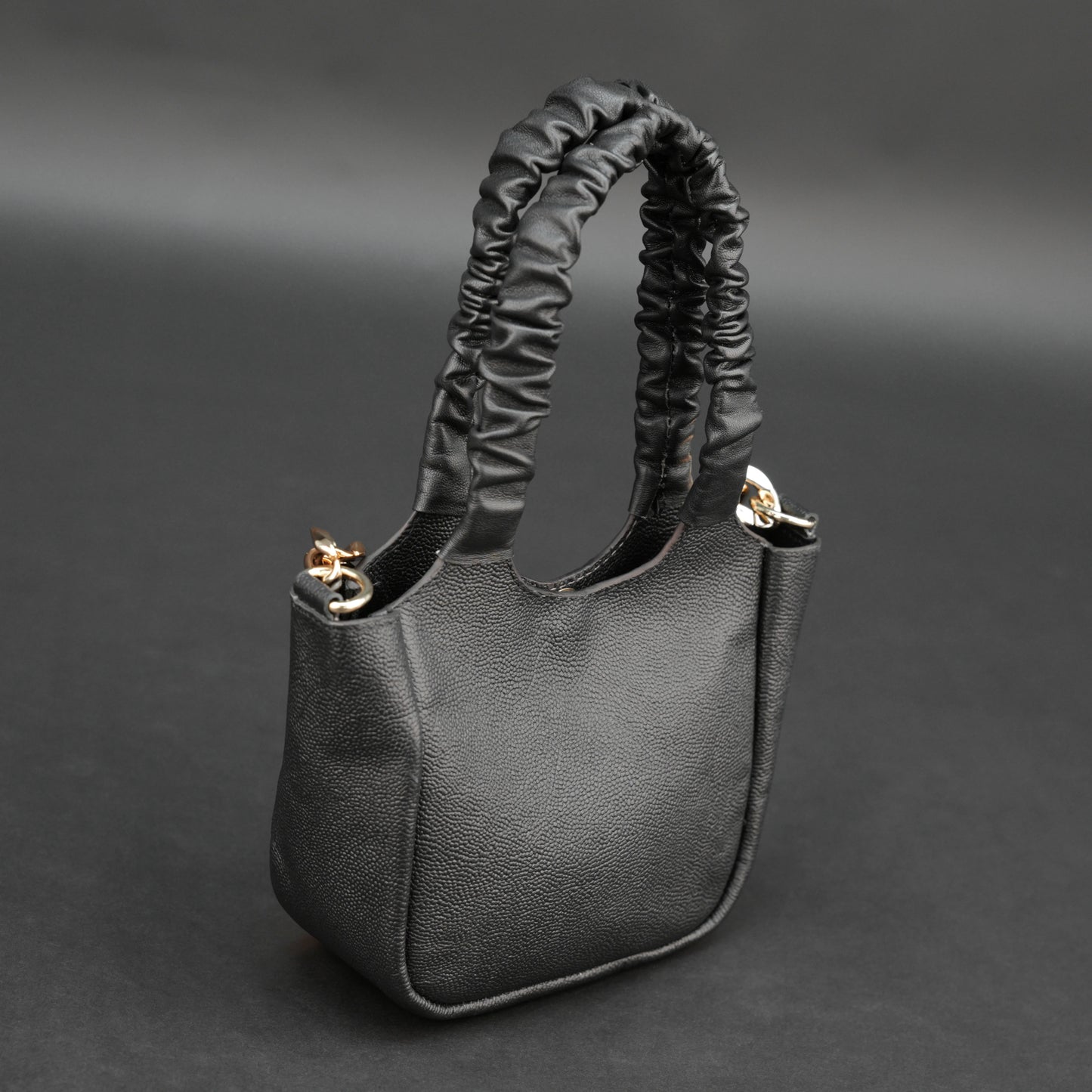 Black sheep croco leather bag with straps and pockets.