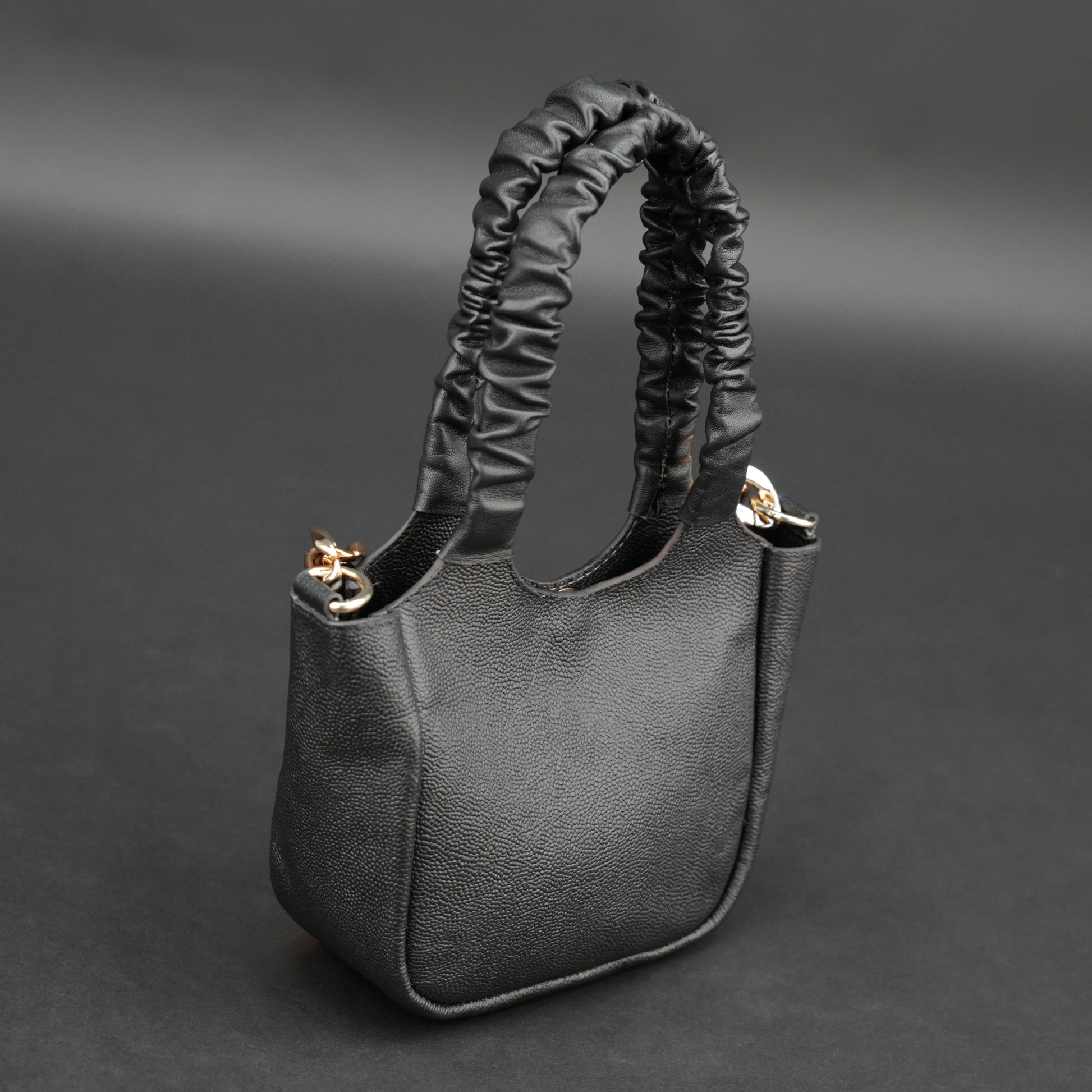 Black sheep croco leather bag with straps and pockets.